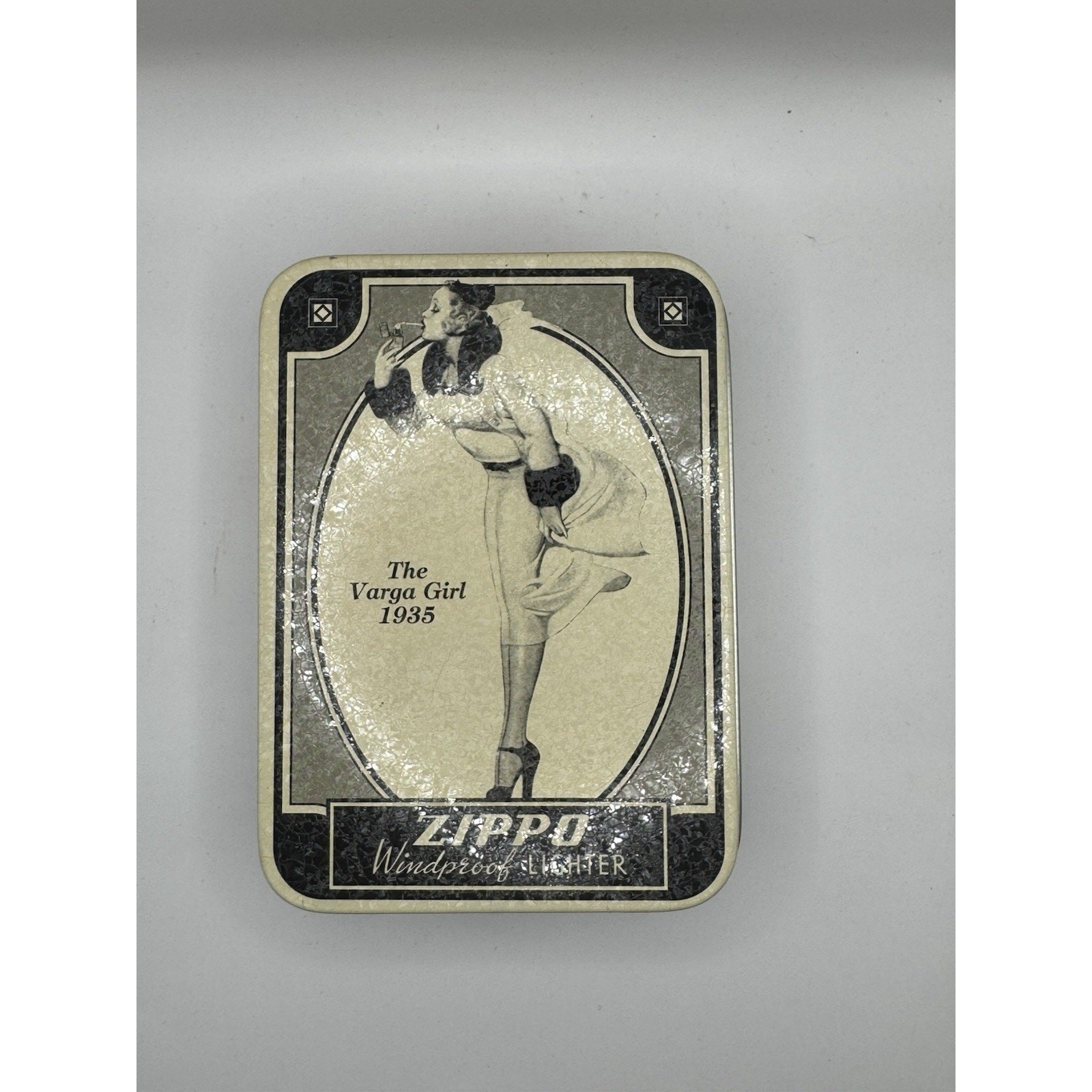 Vintage 1993 Zippo Varga Girl 1935 Collectible of the Year Lighter with Tin Vintage 1993 Zippo Varga Girl 1935 Collectible of the Year Lighter with Tin