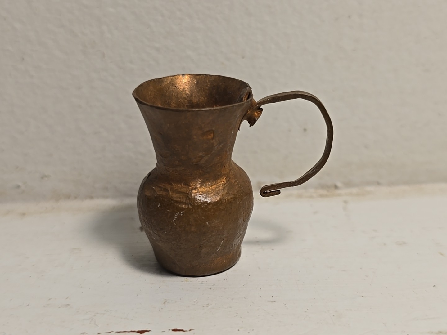 Vintage MINIATURE hand hammered copper pitcher 1 1/4” T