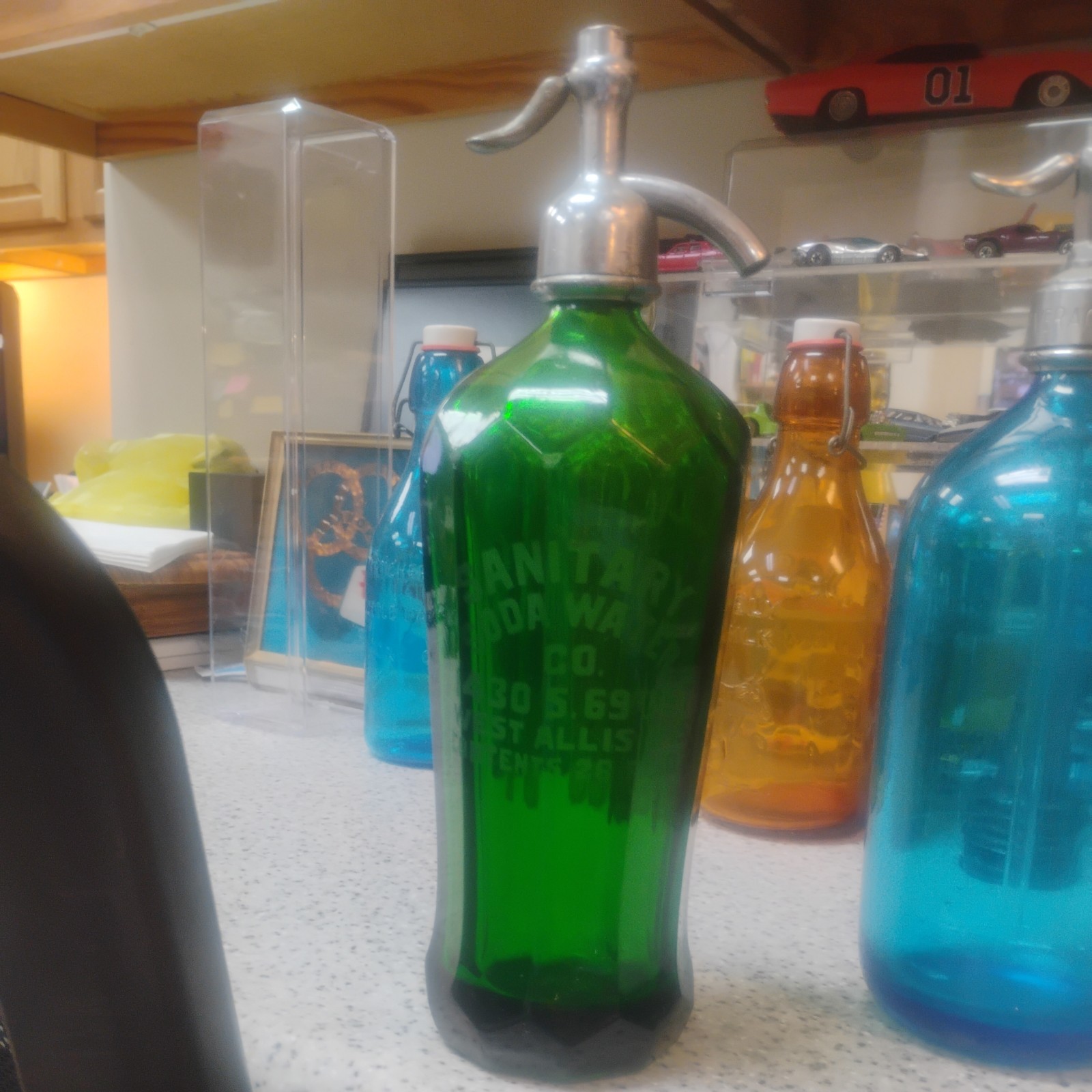 Vintage 10 Sided Green Sanitary Soda Seltzer Bottle with J Vogel & Sons Top Vintage 10 Sided Green Sanitary Soda Seltzer Bottle with J Vogel & Sons Top