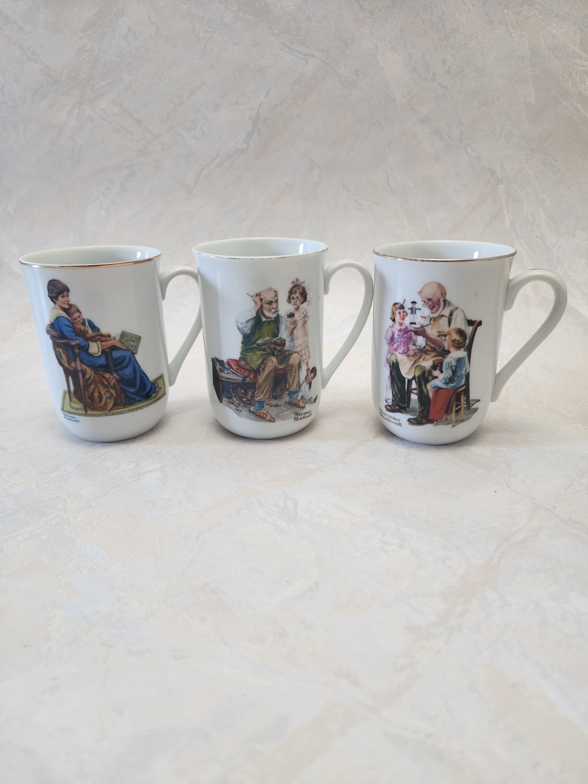 3 Pc Norman Rockwell Mugs Set. The Cobbler, The Toymaker, And Bedtime.