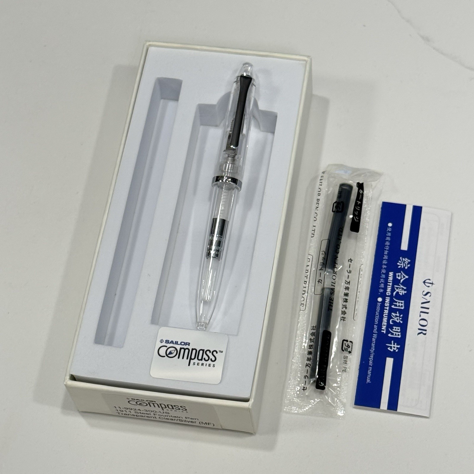 Sailor Compass 1911 Fountain Pen - Medium Fine - Transparent Clear 11-9924-300 Sailor Compass 1911 Fountain Pen - Medium Fine - Transparent Clear 11-9924-300