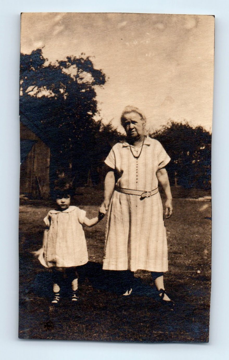 Old Vintage Photo OLDER WOMAN AND GIRL HOLDING HANDS IN YARD ANTIQUE SNAPSHOT
