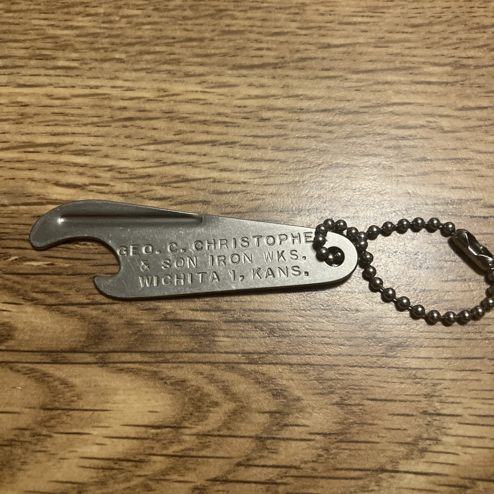 GEO. C. Christopher and sons iron wks. Bottle opener advertisement