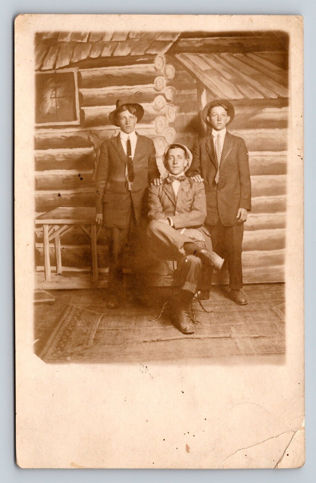 RPPC Boys in Suits Pose in Front of Cabin Screen VNTG Postcard NOKO 1907-1920s