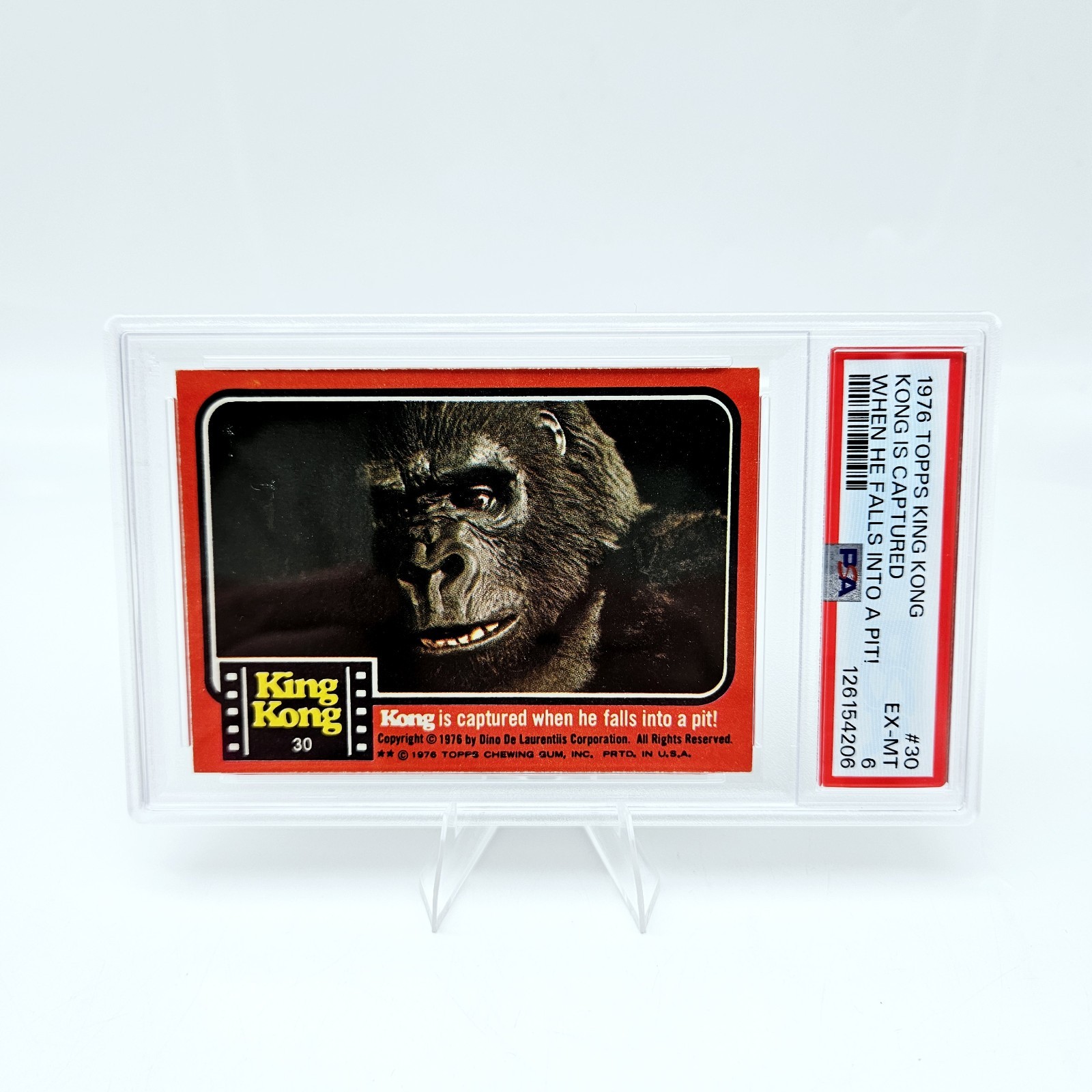 1976 Topps King Kong #30 PSA 6 Kong is Captured When He Falls Into a Pit 1976 Topps King Kong #30 PSA 6 Kong is Captured When He Falls Into a Pit