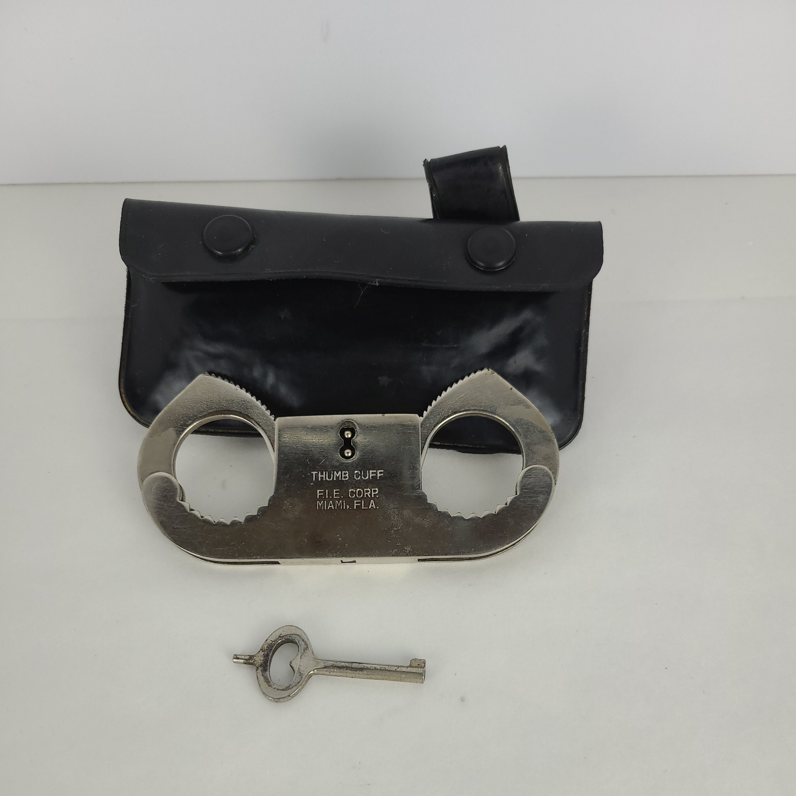 Antique Valor Corp Florida Metal Thumb Cuff Key Belt Holder Restraint Security