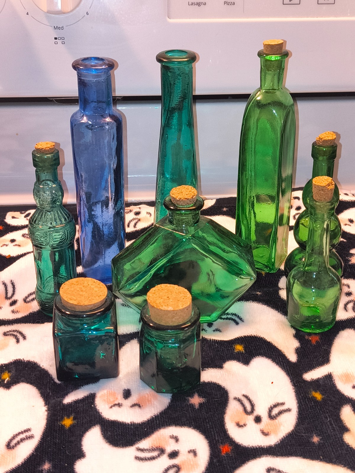 Vintage Spanish Recycled Glass Bottles Set of 9 Green, Blue, Teal W/Corks Vintage Spanish Recycled Glass Bottles Set of 9 Green, Blue, Teal W/Corks