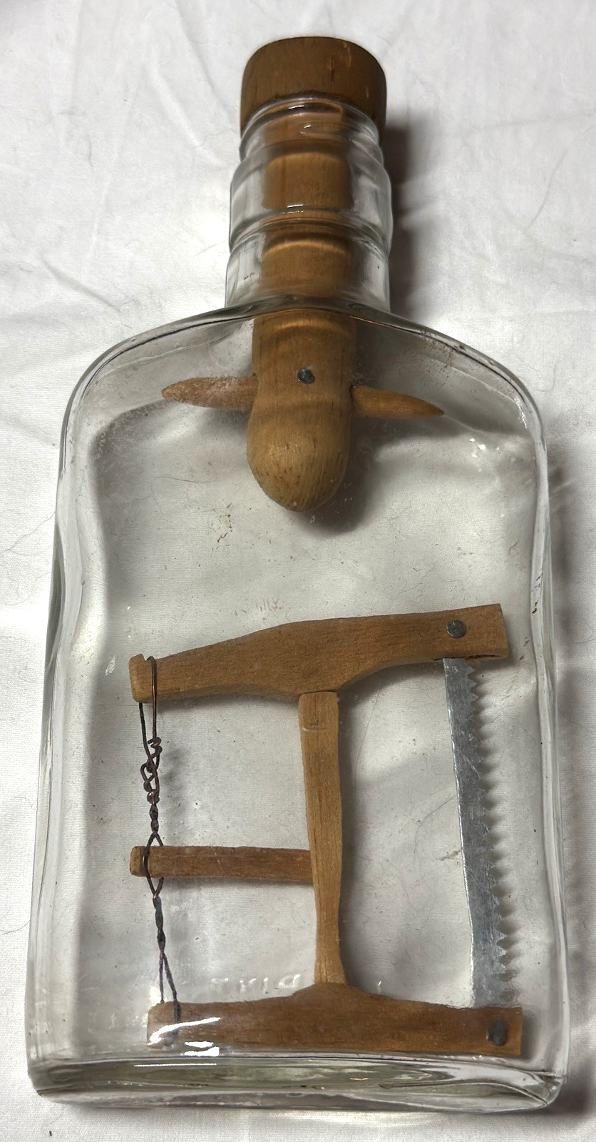 Vintage Handcrafted Wooden Bow Saw In A 1/2 Pint Liquor Bottle Vintage Handcrafted Wooden Bow Saw In A 1/2 Pint Liquor Bottle