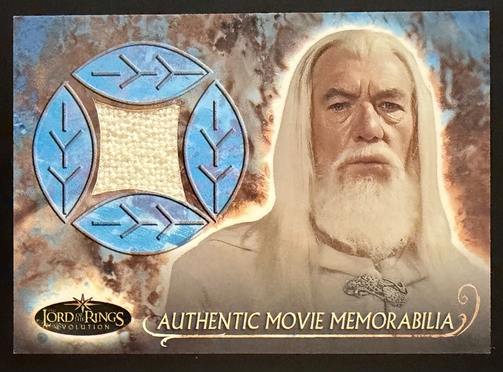 2006 Topps Lord of the Rings Evolution Gandalf\'s Cloak Authentic Memorabilia 2006 Topps Lord of the Rings Evolution Gandalf\'s Cloak Authentic Memorabilia