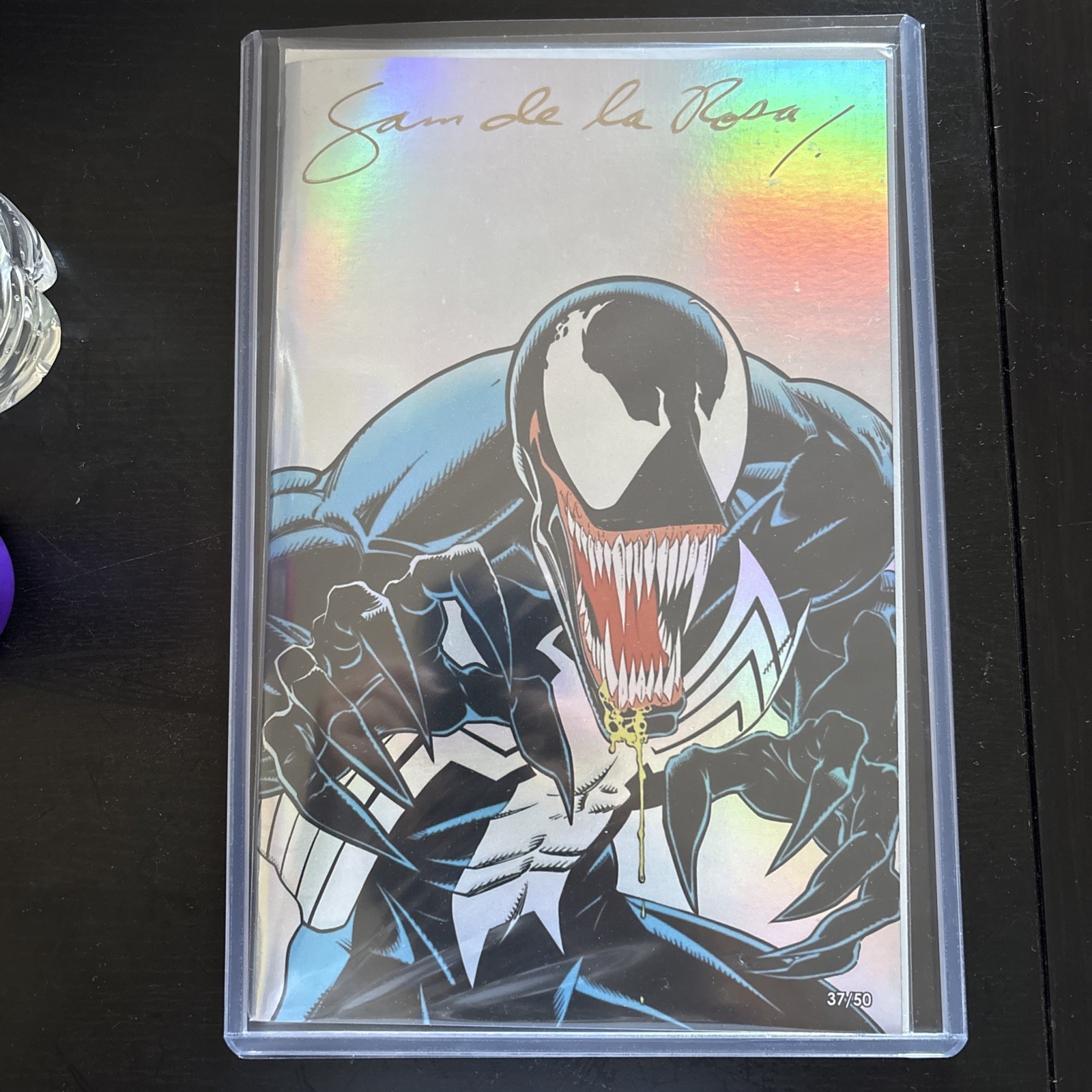 Venom Lethal Protector SDCC EX. Silver rainbow foil. Signed by Sam Del La Rosa Venom Lethal Protector SDCC EX. Silver rainbow foil. Signed by Sam Del La Rosa