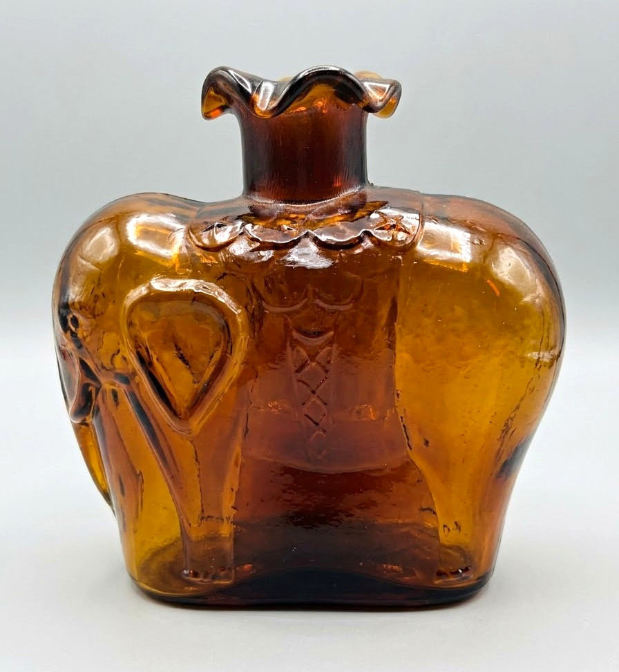Vintage Amber Glass Elephant Bottle Likely Clevenger Bros. Vintage Amber Glass Elephant Bottle Likely Clevenger Bros.