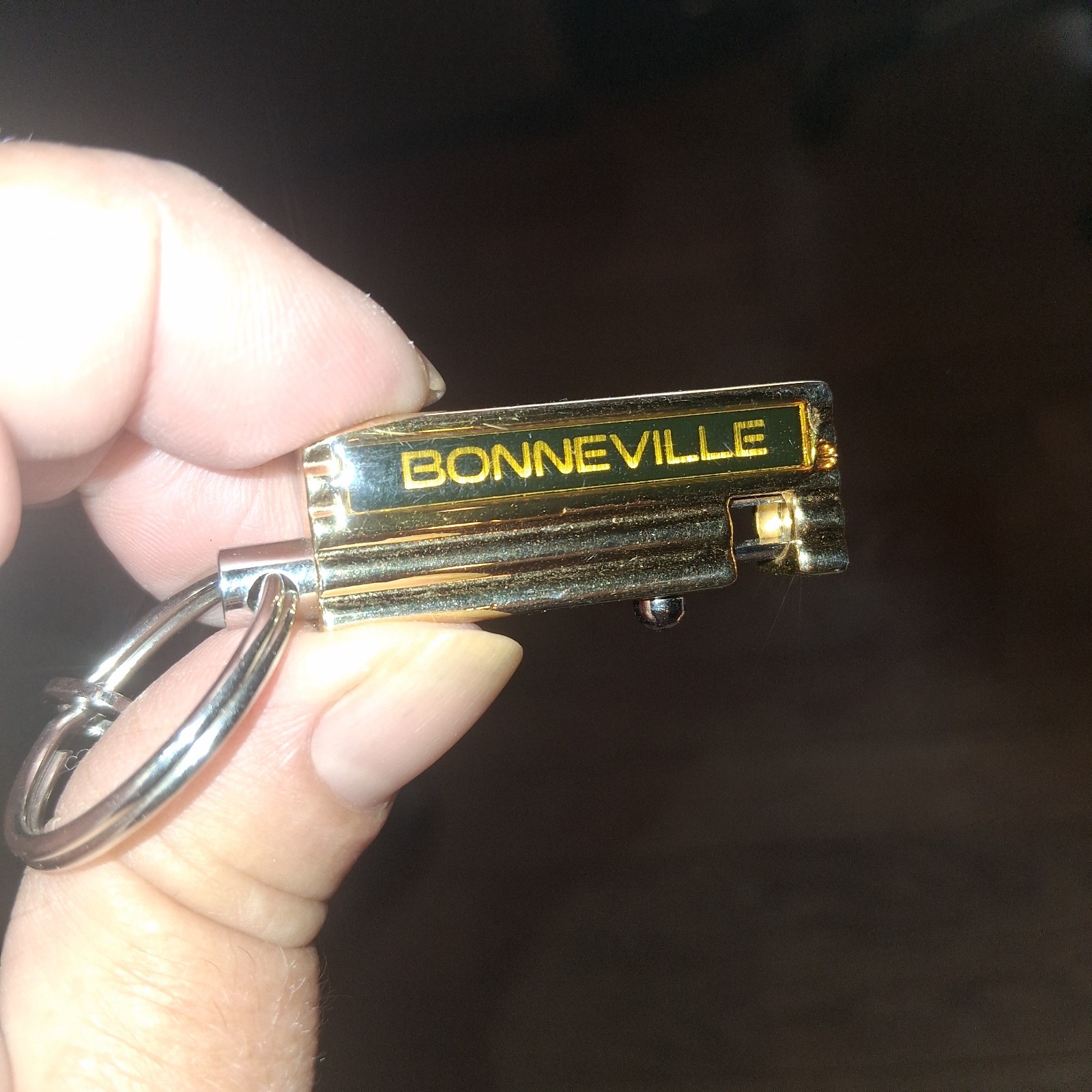PONTIAC BONNEVILLE SPRING KEYCHAIN FOB MAIL DROP TAG GOLD TONE BIRMINGHAM MI...