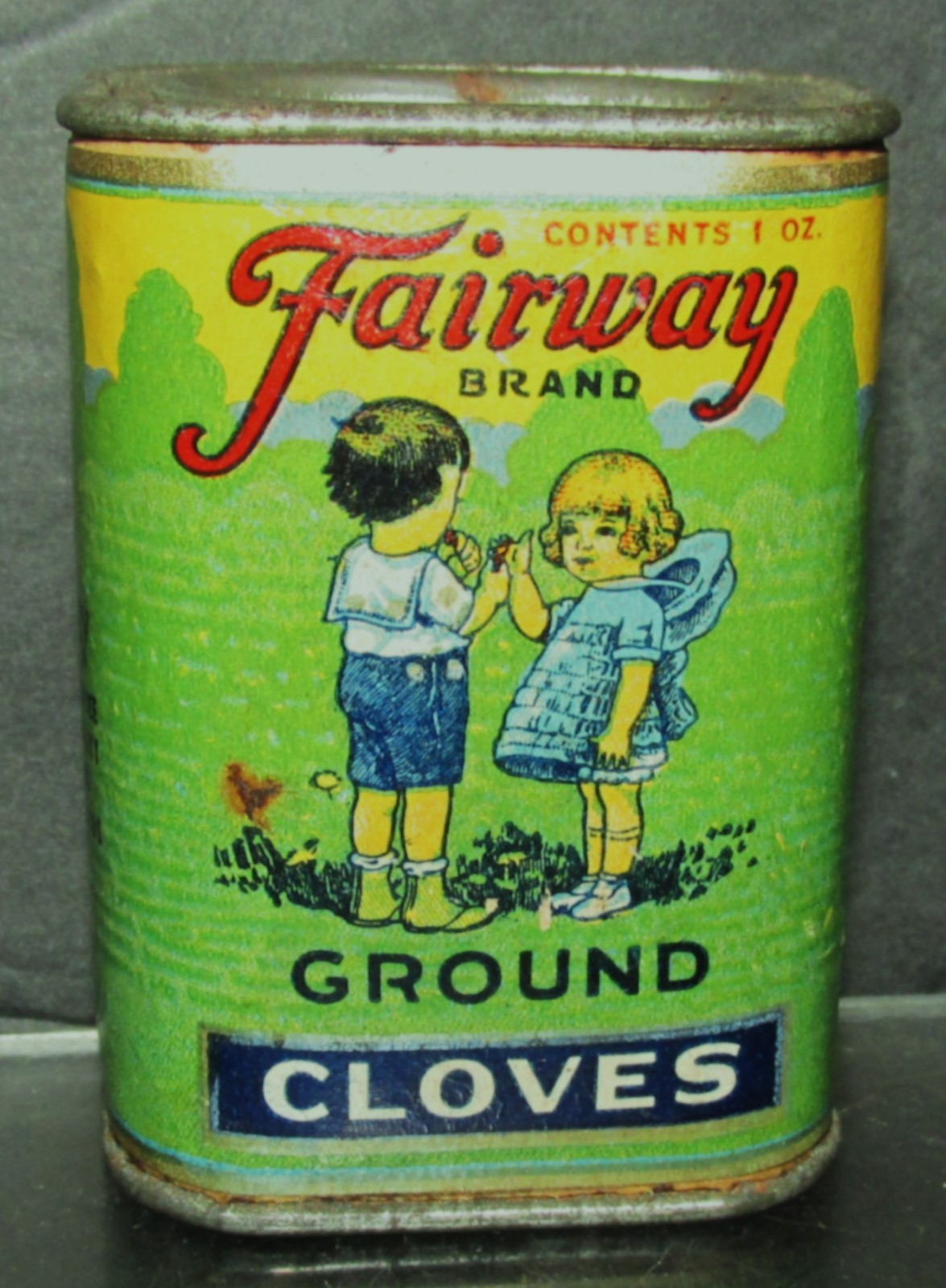 Original Vintage 1 oz. Fairway Brand Ground Clove Spice Tin With Two Children Original Vintage 1 oz. Fairway Brand Ground Clove Spice Tin With Two Children