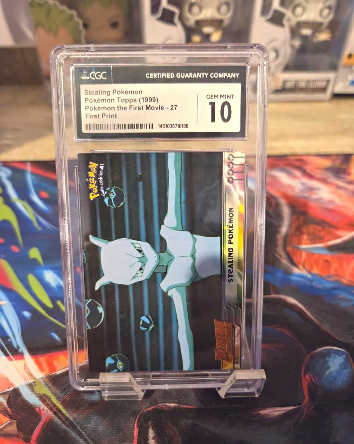 Topps 1999 Pokémon #27 Stealing Pokémon Mewtwo First Print CGC 10 Topps 1999 Pokémon #27 Stealing Pokémon Mewtwo First Print CGC 10