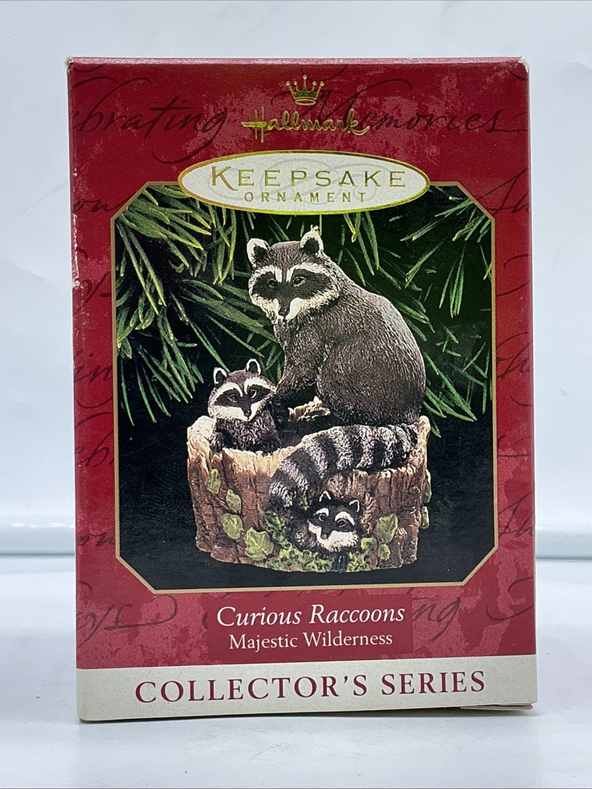1999 Hallmark Keepsake Christmas Ornament “Curious Raccoons