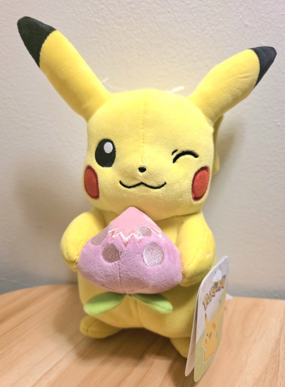 Pokemon Spring Pikachu Plush Winking Holding Pecha Berry 8 Inch Stuffed Toy NWT Pokemon Spring Pikachu Plush Winking Holding Pecha Berry 8 Inch Stuffed Toy NWT