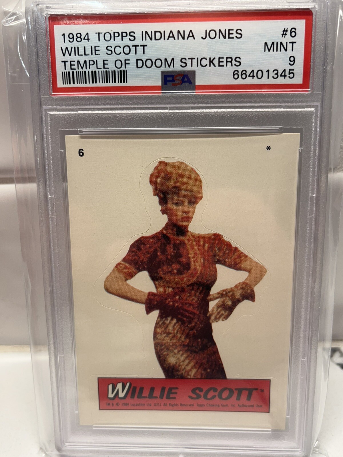Willie Scott - Indiana Jones & The Temple Of Doom 1984 Topps Sticker #6 PSA 9 Willie Scott - Indiana Jones & The Temple Of Doom 1984 Topps Sticker #6 PSA 9