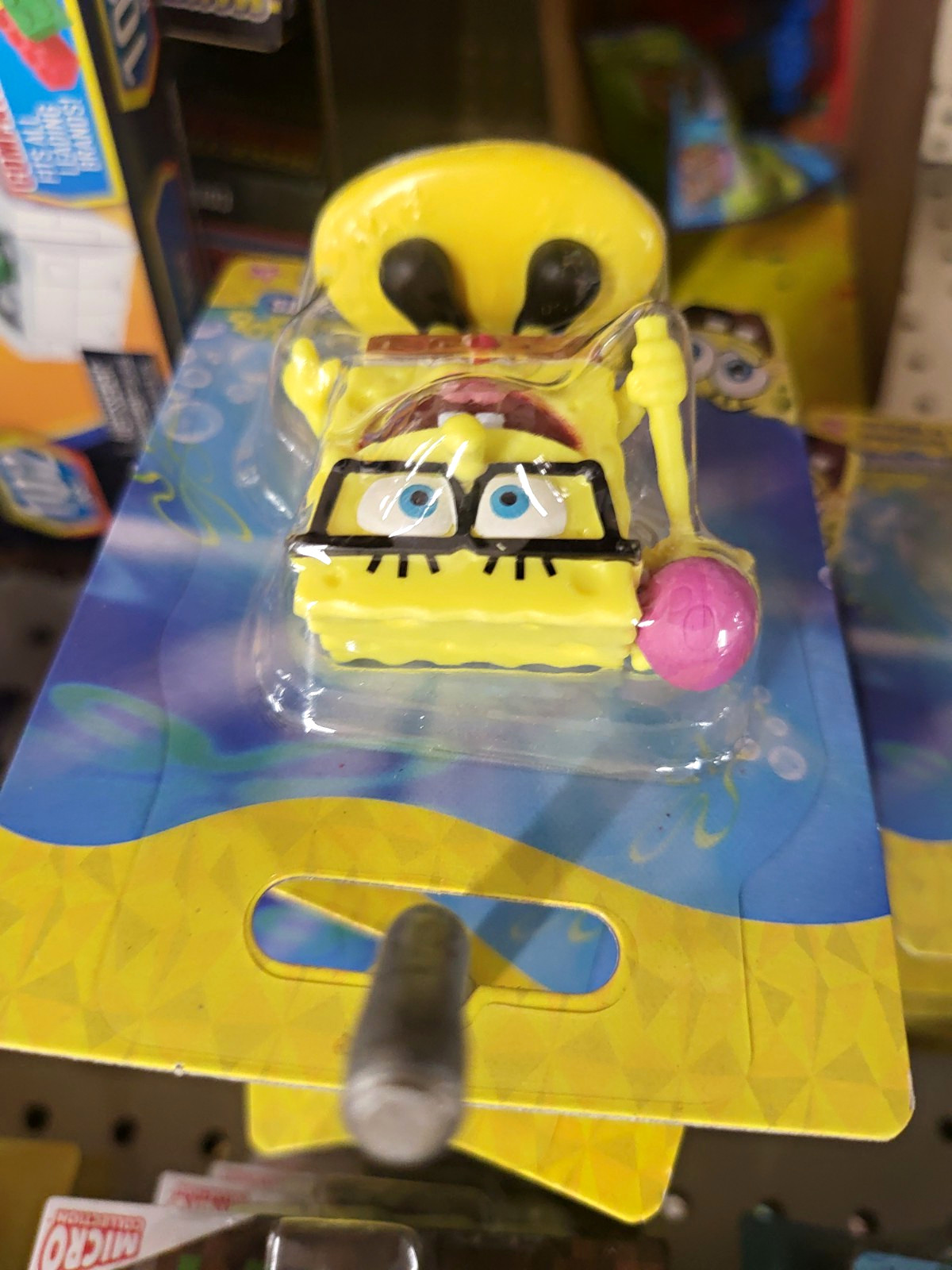 Nickelodeon SpongeBob SquarePants Micro Figure w/ Glasses & Pink Lollipop Boxed Nickelodeon SpongeBob SquarePants Micro Figure w/ Glasses & Pink Lollipop Boxed
