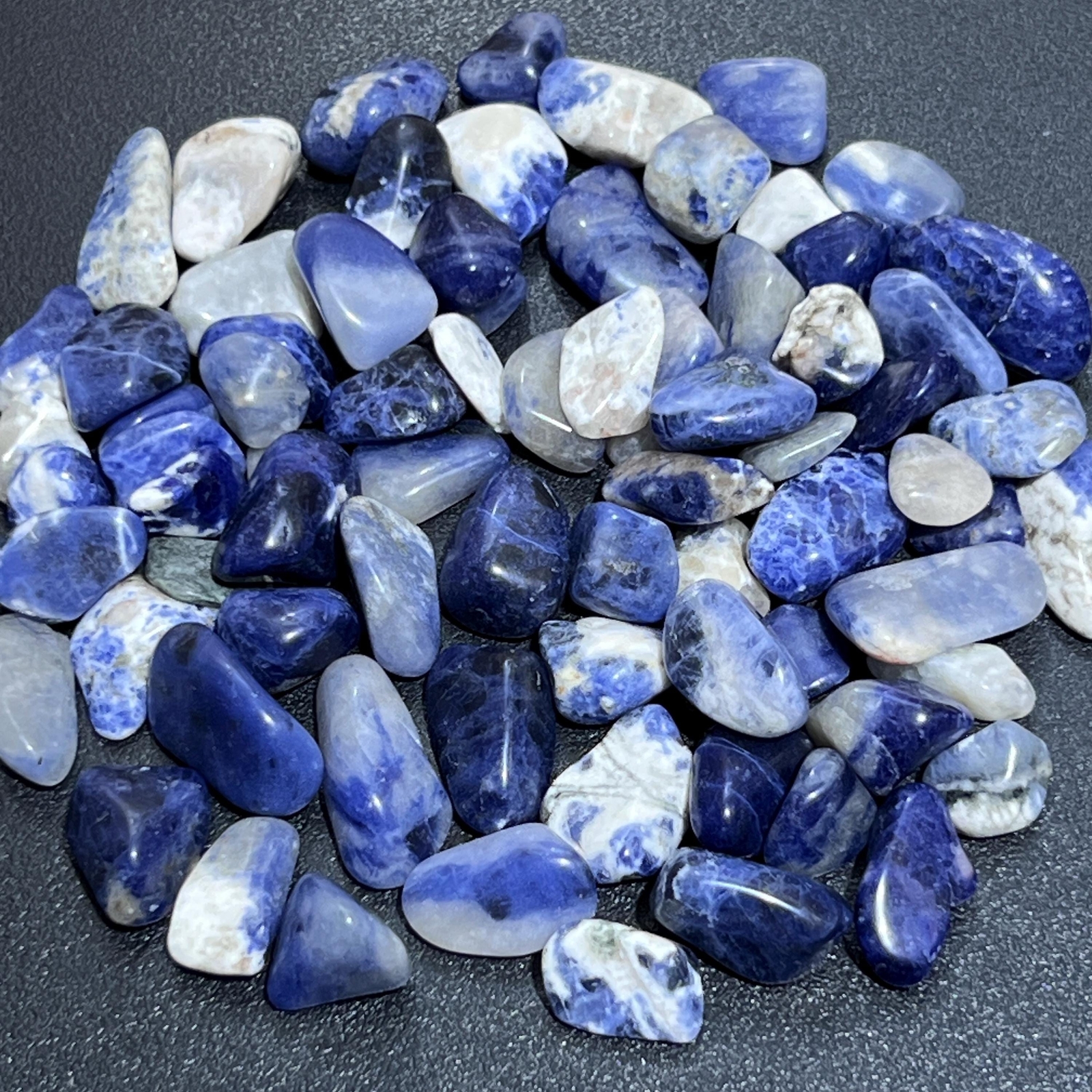 Blue Sodalite Small Tumbled Stones (By The Ounce or Pound) Wholesale Blue Sodalite Small Tumbled Stones (By The Ounce or Pound) Wholesale
