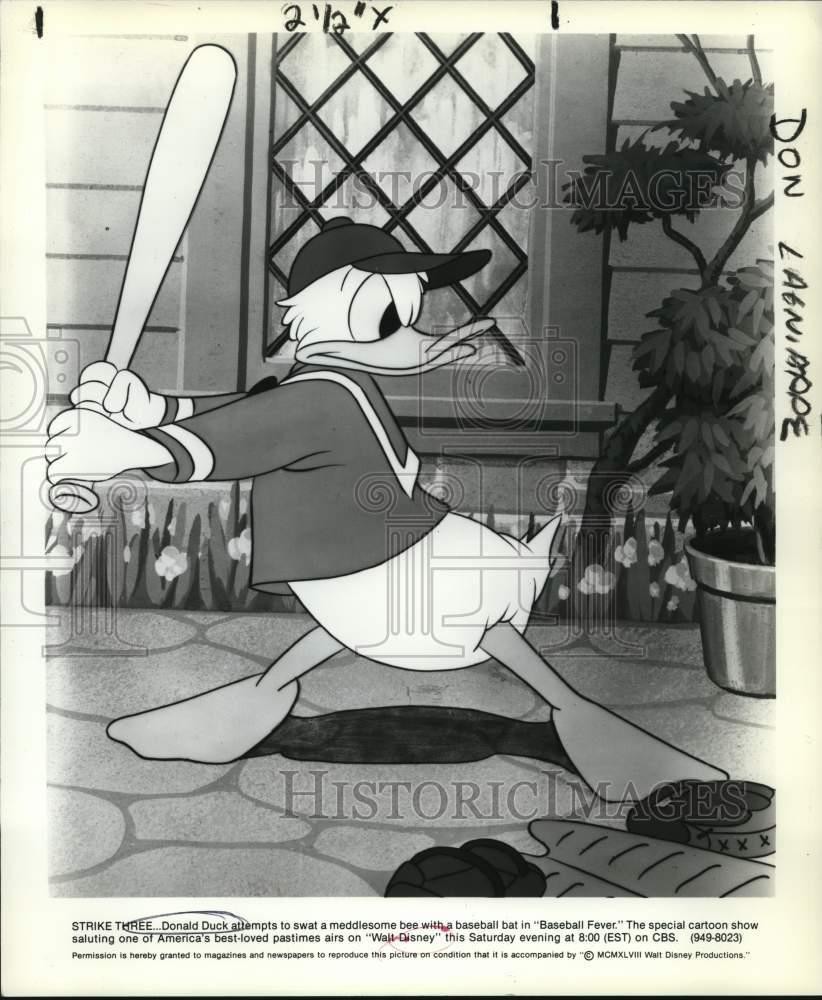 1948 Press Photo Donald Duck swats bee in 1948 Press Photo Donald Duck swats bee in