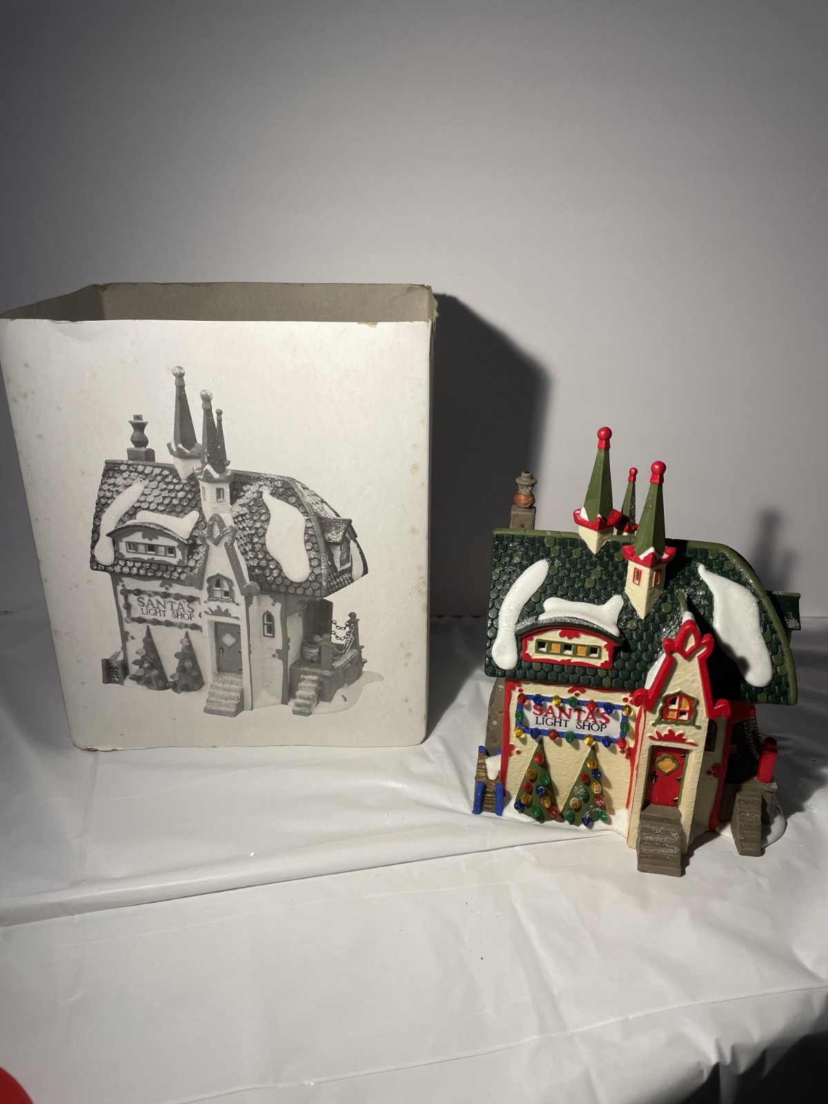 Vintage 1997 Dept 56 North Pole Series “Santa's Light Shop” Lighted Retired NEW Vintage 1997 Dept 56 North Pole Series “Santa's Light Shop” Lighted Retired NEW