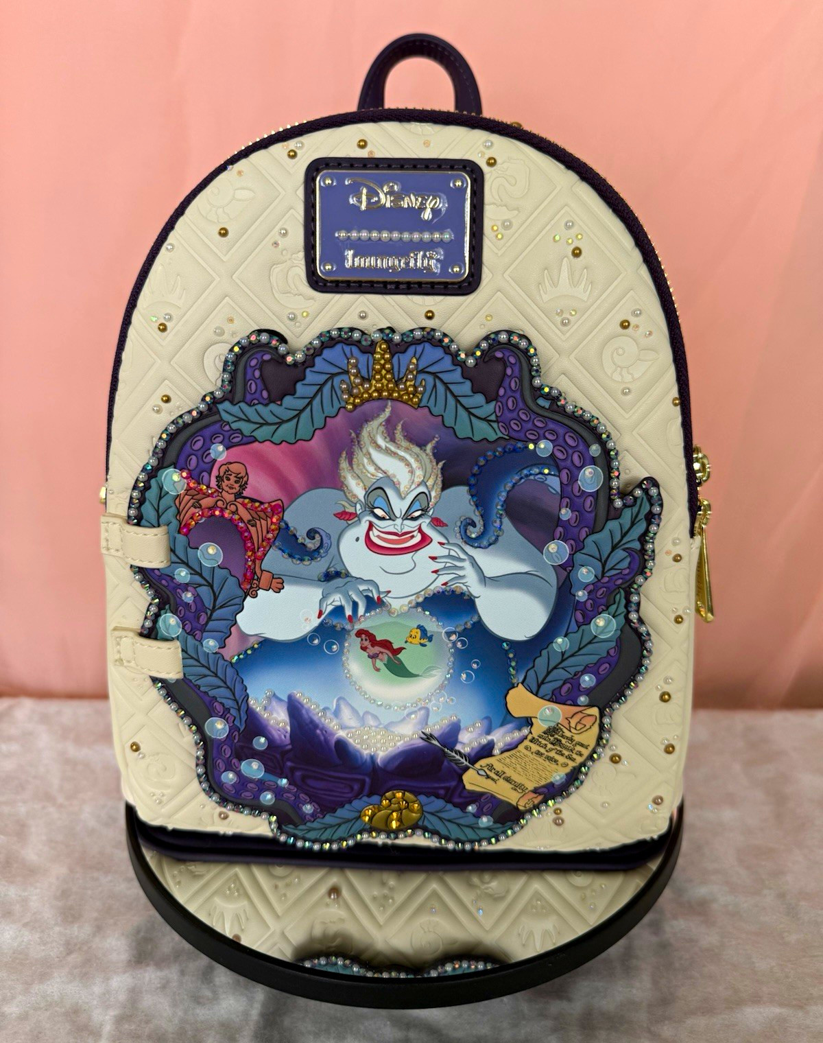 Ursula Disney Villain Mini Backpack – hand decorated with Pearls and Rhinestone Ursula Disney Villain Mini Backpack – hand decorated with Pearls and Rhinestone