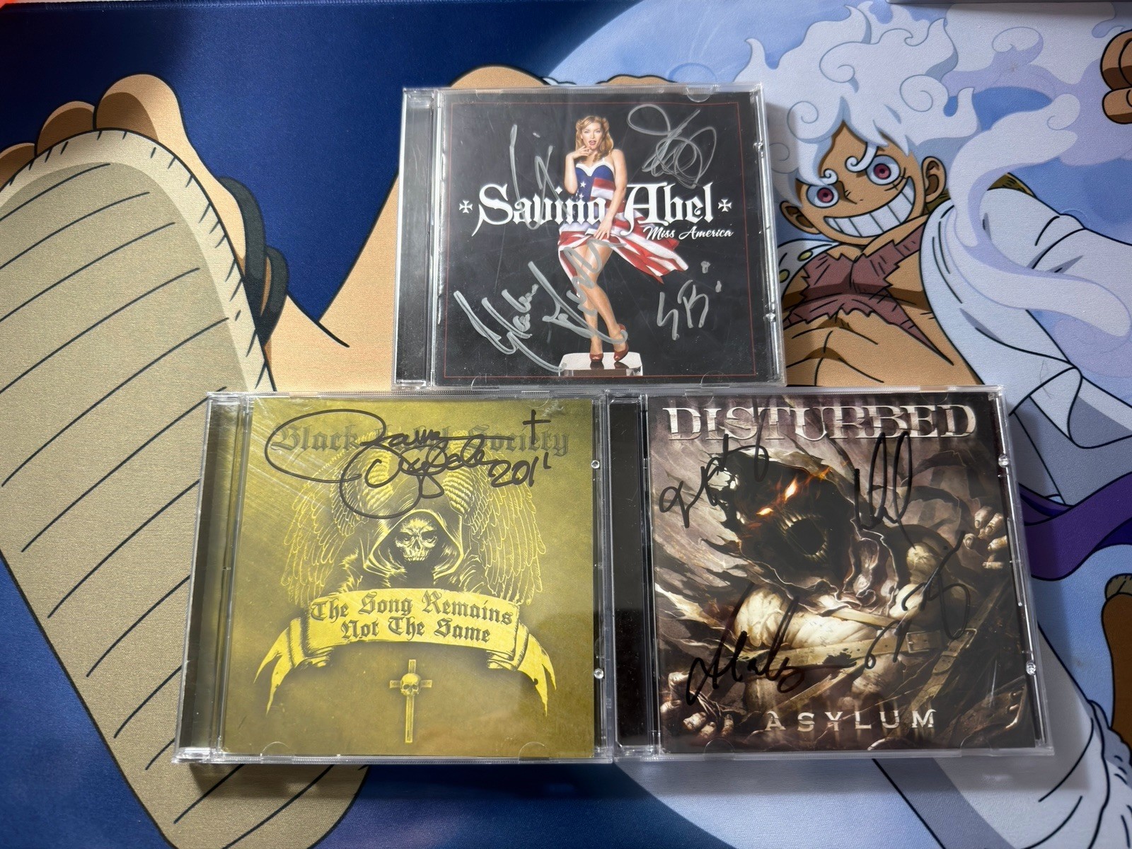 Signed CD Lot ( Black Lable Society, Disturbed, Saving Able) *READ DISCRIPTION* Signed CD Lot ( Black Lable Society, Disturbed, Saving Able) *READ DISCRIPTION*