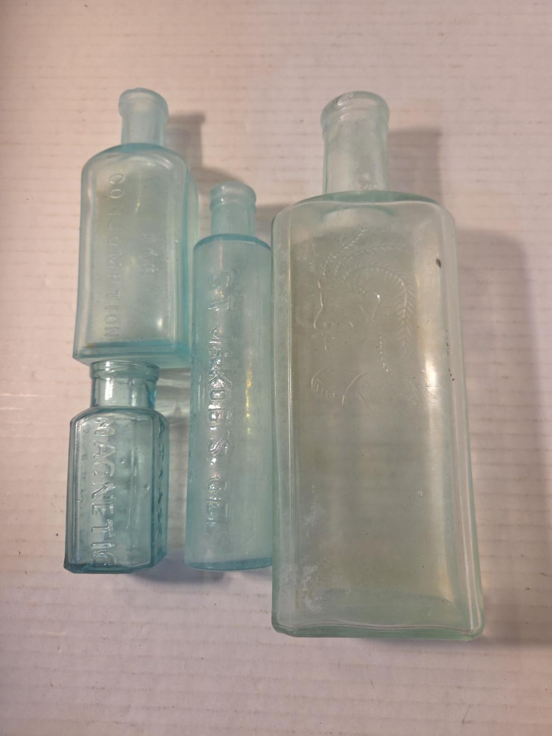 4 Antique Aqua Medicine Bottle Lot, Indian Sagwa Piso’s Cure St. Jacobs Oil 1885