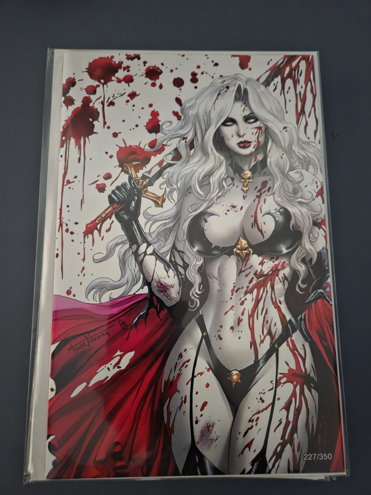 Lady Death: Malevolent Decimation #1 Kirkham Battle Damage Variant LTD 227 /350 Lady Death: Malevolent Decimation #1 Kirkham Battle Damage Variant LTD 227 /350