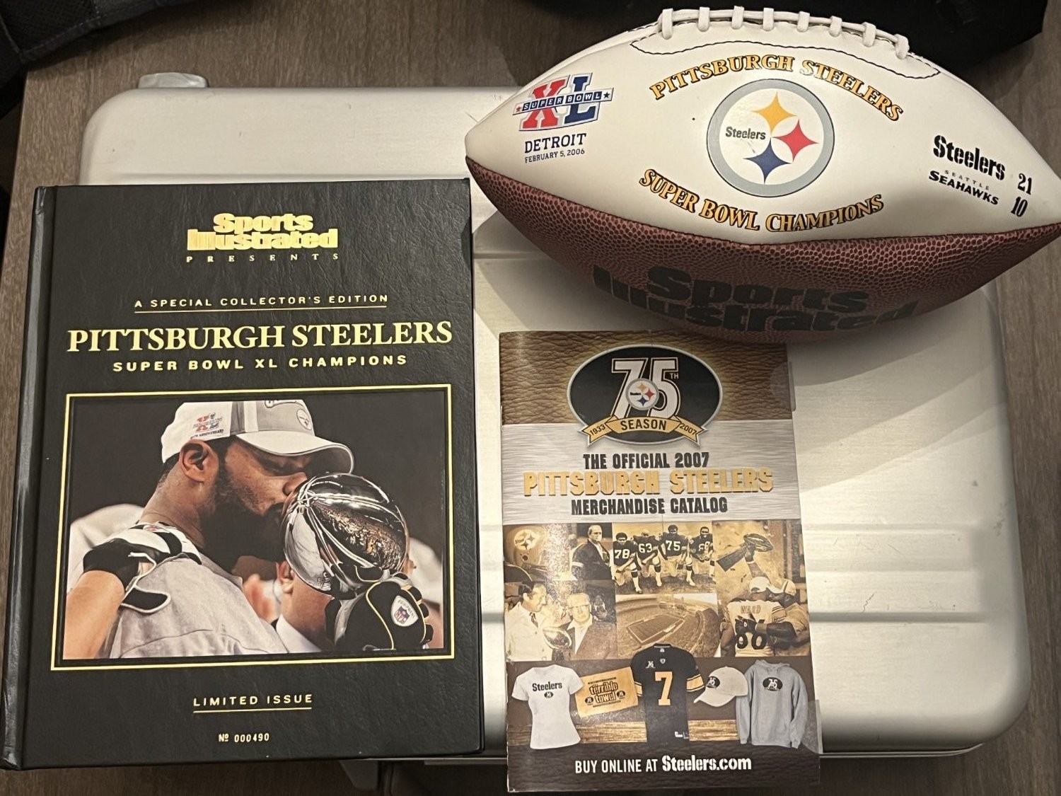 Pittsburgh Steelers Super Bowl XL commemorative football, 2005 book & 07 Catalog Pittsburgh Steelers Super Bowl XL commemorative football, 2005 book & 07 Catalog