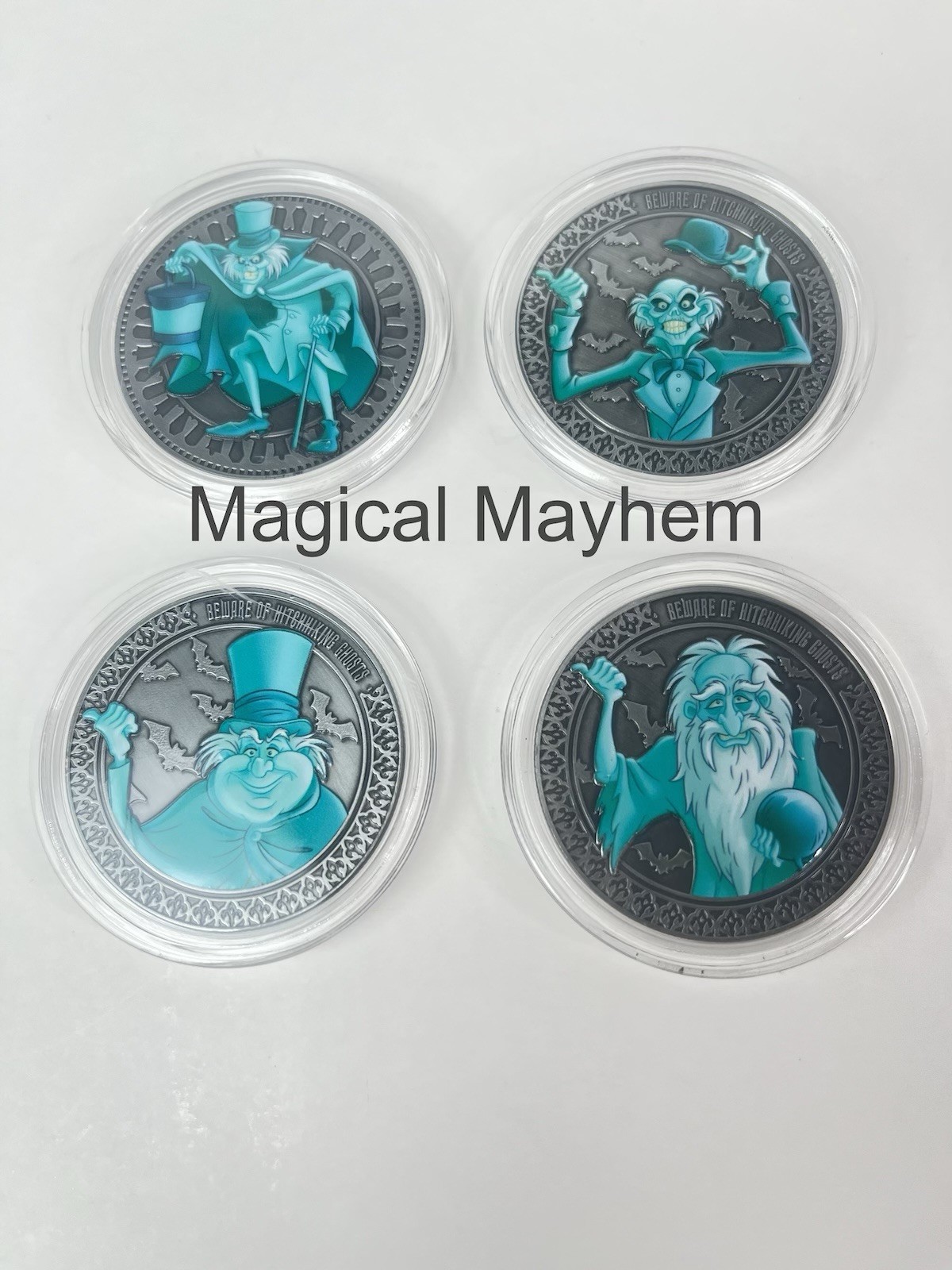 Walt Disney World Haunted Mansion Hatbox Ghosts Collectible Medallion Set Walt Disney World Haunted Mansion Hatbox Ghosts Collectible Medallion Set