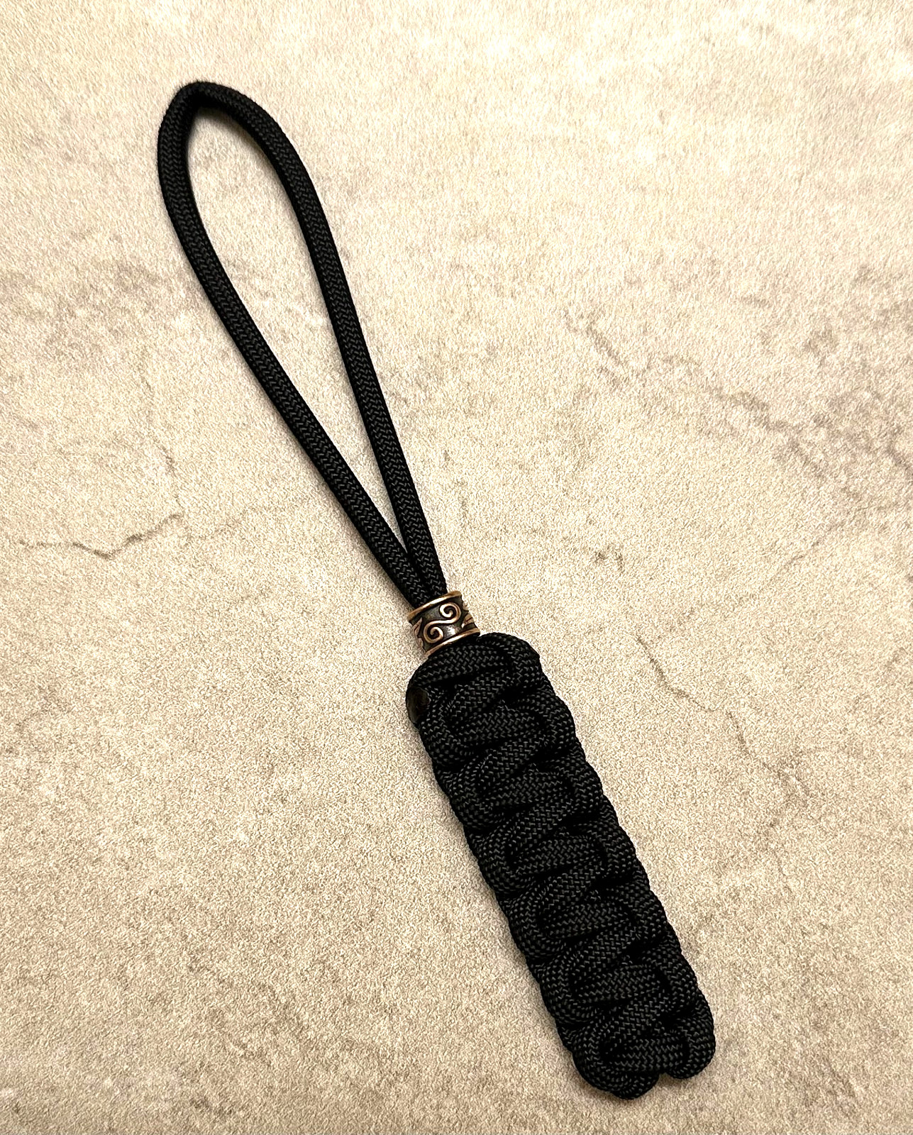6 INCH KNIFE LANYARD BLACK 550 PARACORD LANYARD WITH COPPER DECORATIVE COLUMN 6 INCH KNIFE LANYARD BLACK 550 PARACORD LANYARD WITH COPPER DECORATIVE COLUMN