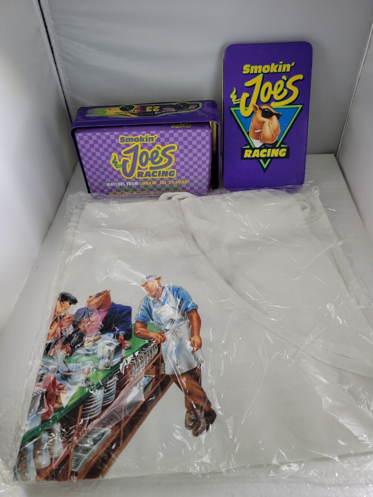 1993 Joe Camel Open 24 Joes Diner Tie Back White Apron and Joe's Matches (TK).