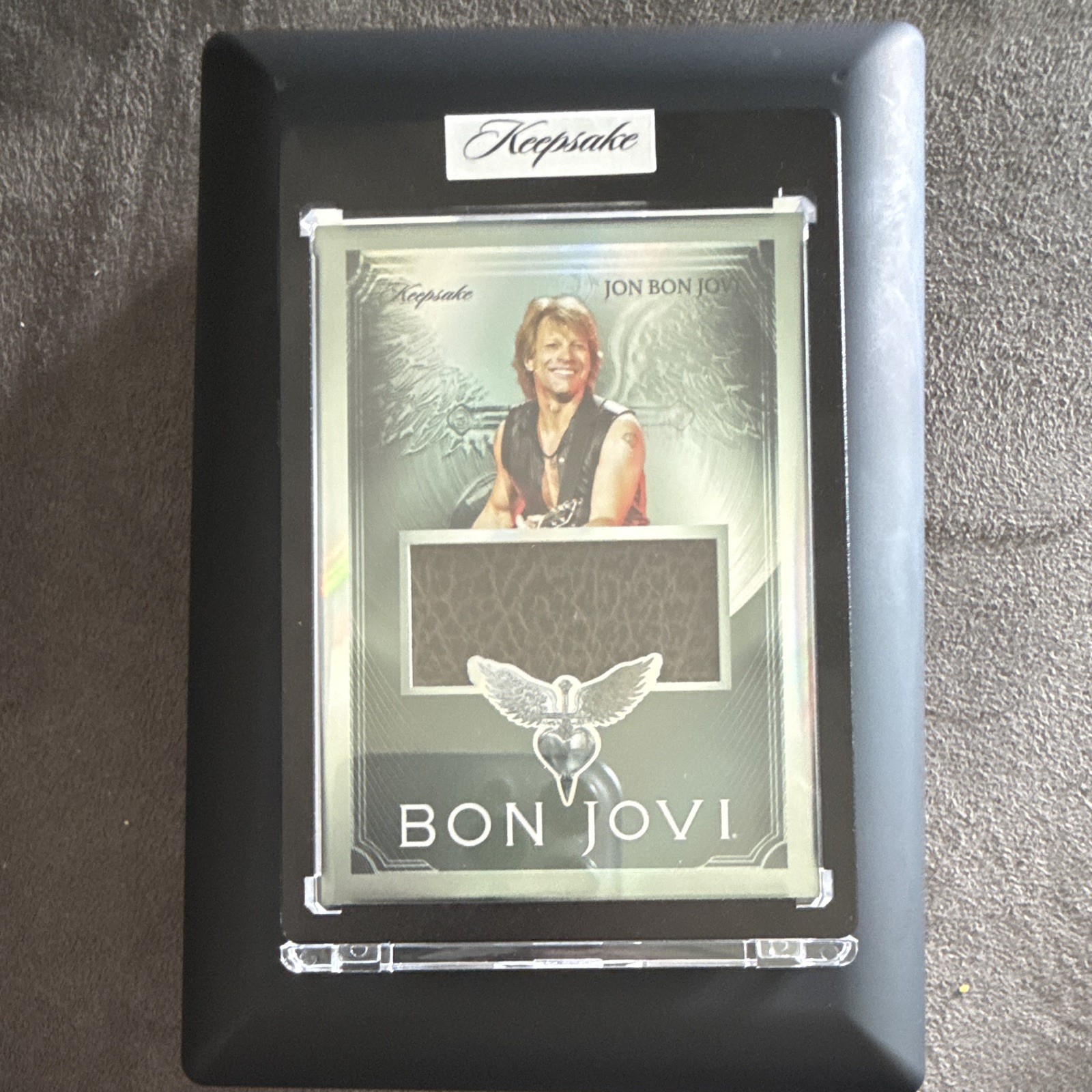 2026 Bon Jovi Keepsake Jon Bon Jovi Authentic Artifact Relic 2/4 Encased 2026 Bon Jovi Keepsake Jon Bon Jovi Authentic Artifact Relic 2/4 Encased