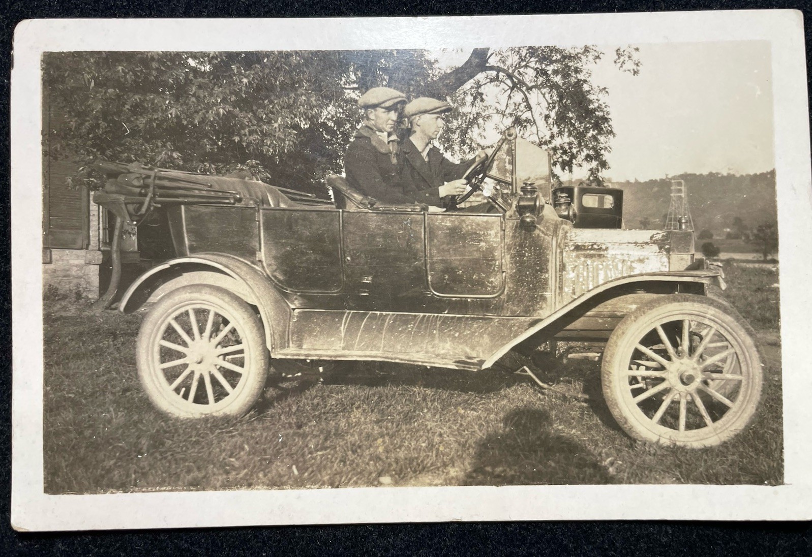 1910 ERA TOURING CAR TWO MEN DRIVING VINTAGE UNPOSTED REAL PHOTO POSTCARD P119