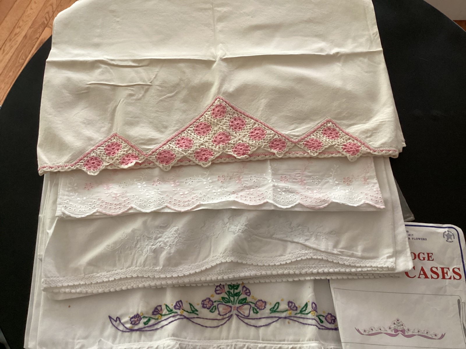 7 Vintage Embroidered/cutwork Pillowcases 3 pairs and 1 7 Vintage Embroidered/cutwork Pillowcases 3 pairs and 1