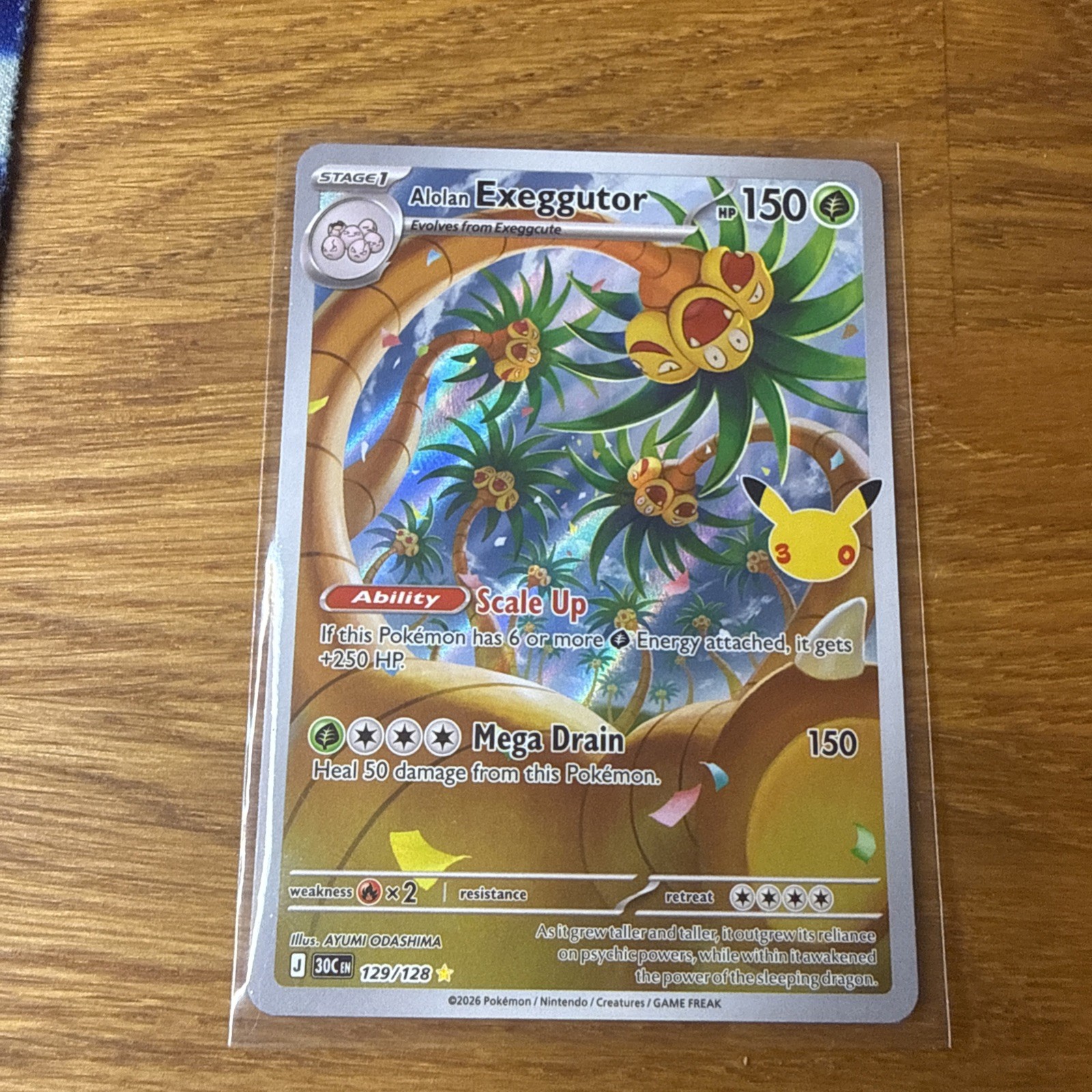 Alolan Exeggutor 129/128 Holo 30th Anniversary - Illustration Rare Pokemon Card Alolan Exeggutor 129/128 Holo 30th Anniversary - Illustration Rare Pokemon Card