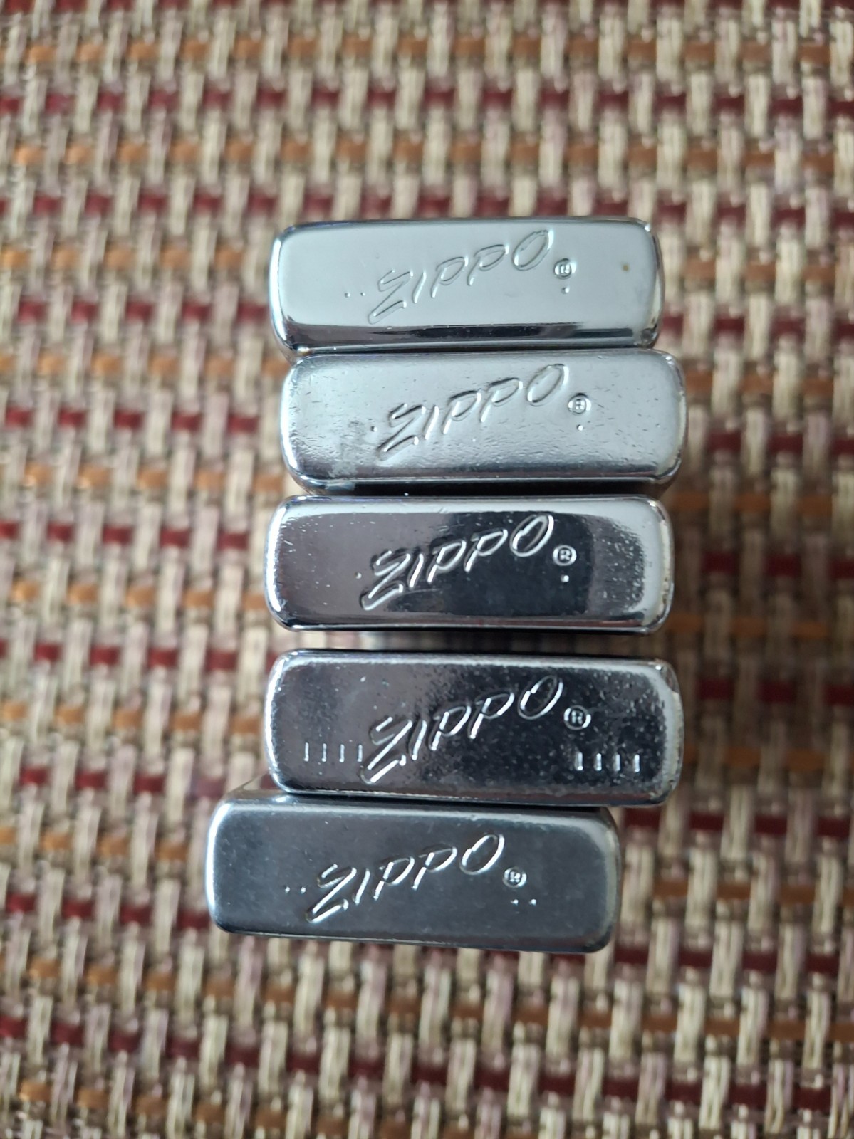 Five Flat Bottom Zippo Slim Lighters.61,62,63,66.
