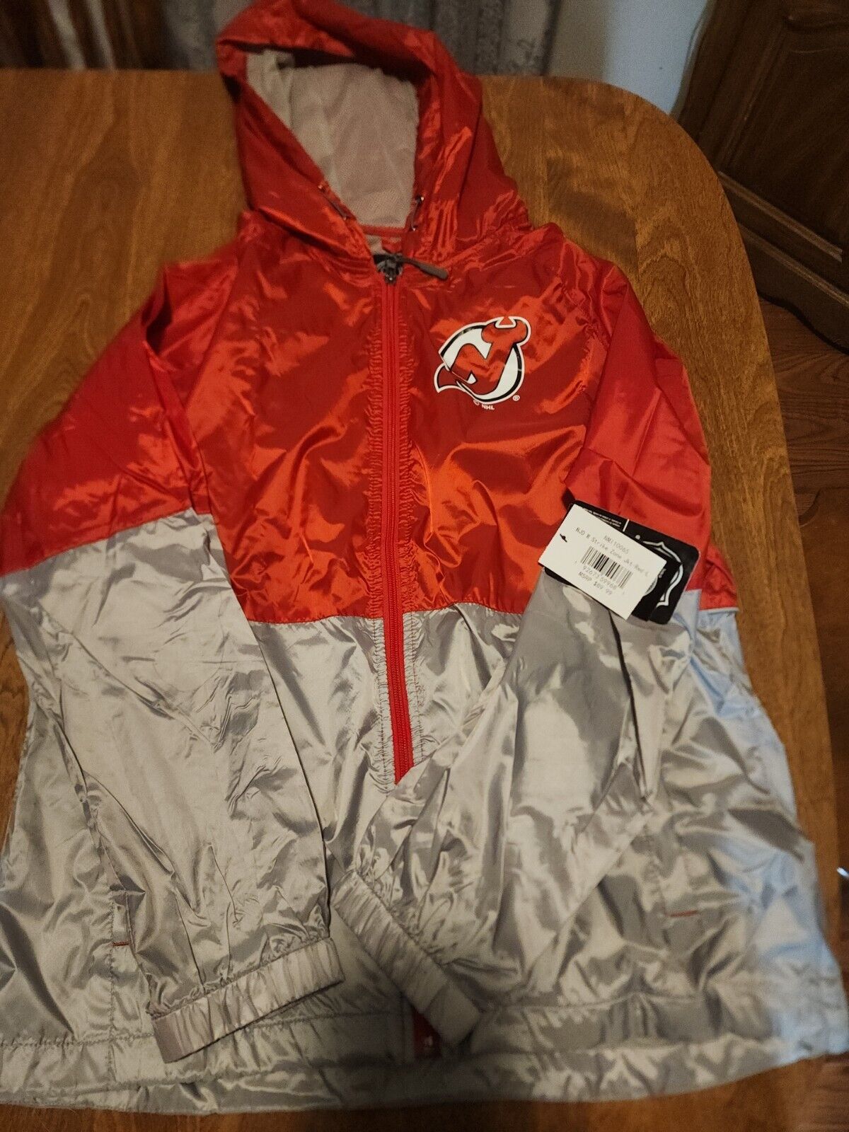 NJ Devils Womens Strike Zone Rain Jacket Large