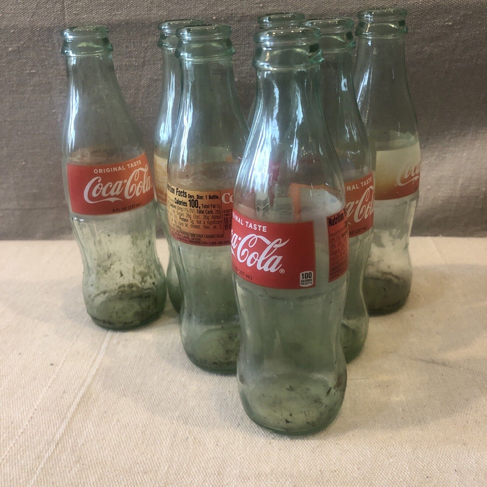 Coca Cola Empty Bottles 8 Fl Oz Each Vintage ( 7 Bottle Lot ) Original Taste
