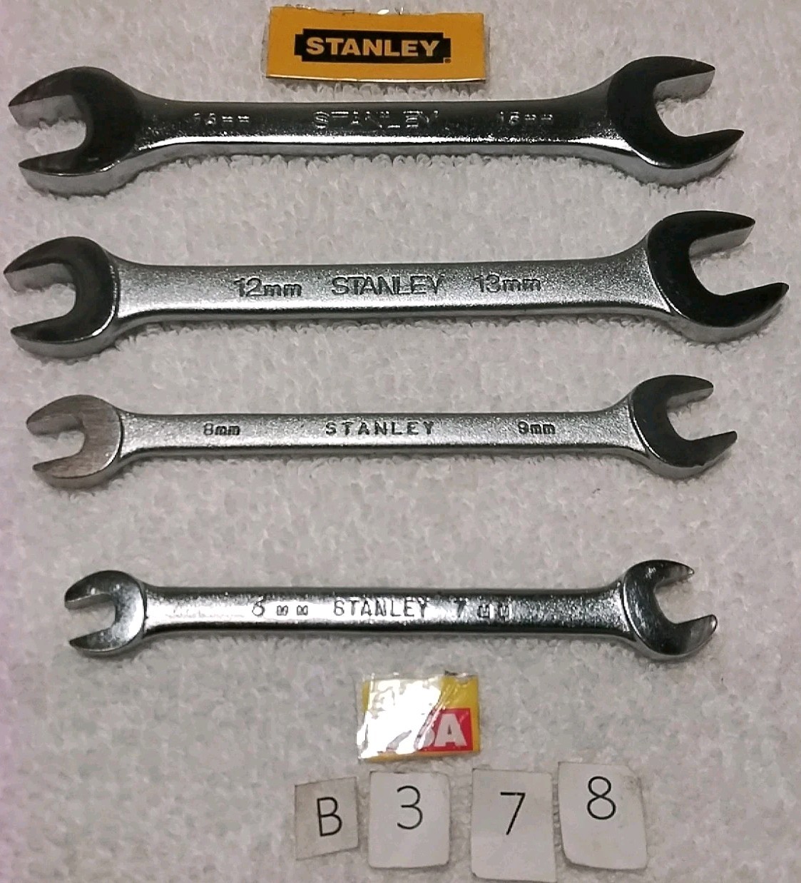 4pc STANLEY 15mm- 14mm- 13mm- 12mm- 9mm- 8mm - 7mm- 6mm OPEN END WRENCH SET... 4pc STANLEY 15mm- 14mm- 13mm- 12mm- 9mm- 8mm - 7mm- 6mm OPEN END WRENCH SET...