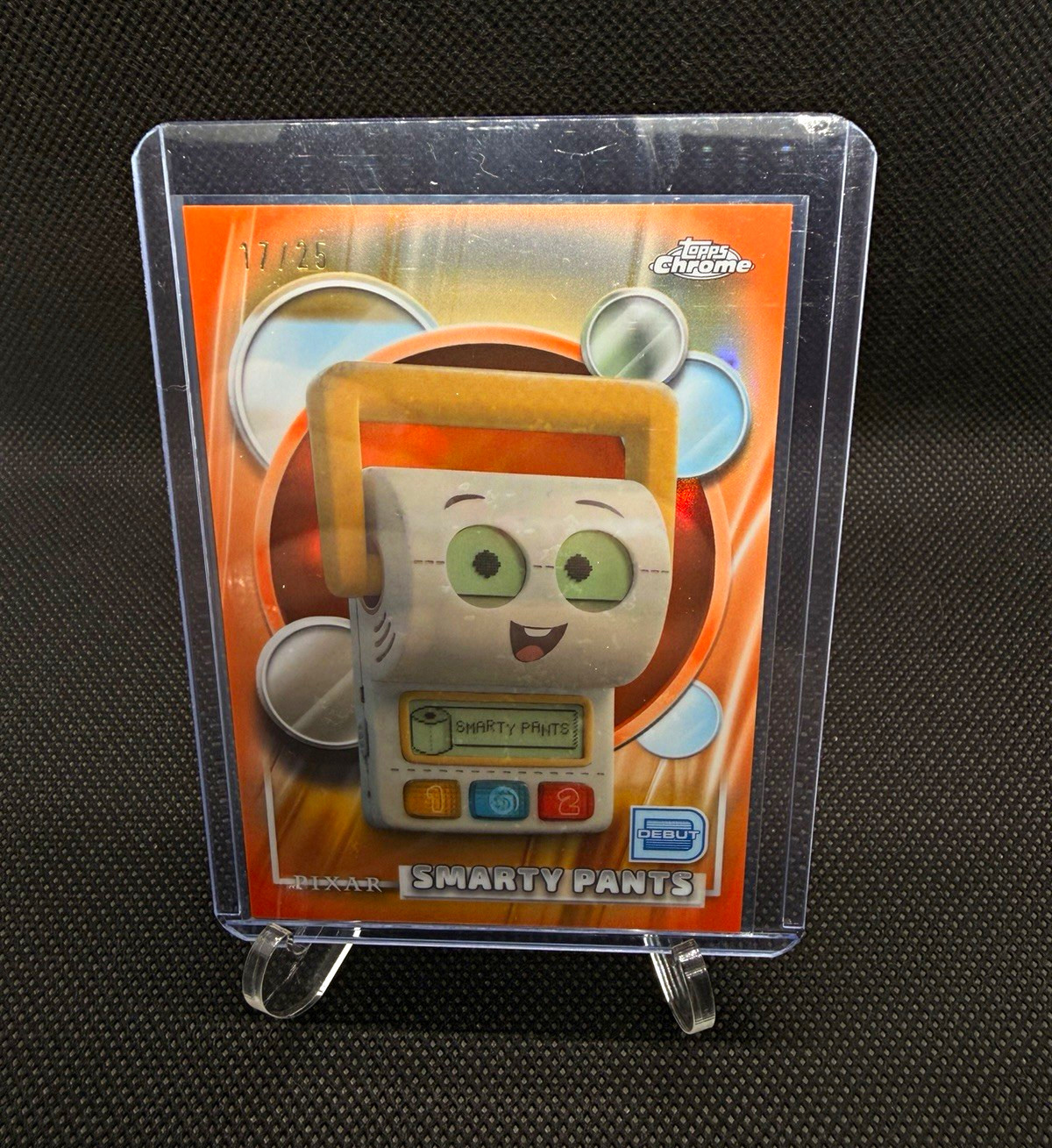 Topps 2026 Topps Chrome Pixar Disney Smarty Pants #198 Orange Refractor /25 Topps 2026 Topps Chrome Pixar Disney Smarty Pants #198 Orange Refractor /25