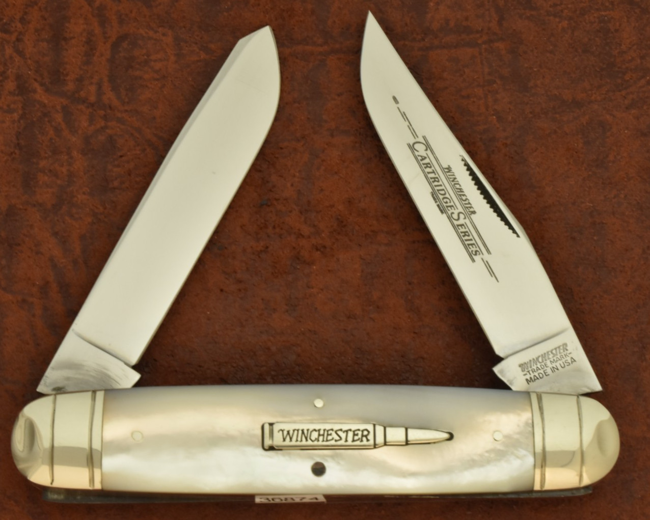WINCHESTER TRADEMARK MADE IN USA AAA+ MOTHER OF PEARL BULLET MOOSE KNIFE (36874) WINCHESTER TRADEMARK MADE IN USA AAA+ MOTHER OF PEARL BULLET MOOSE KNIFE (36874)