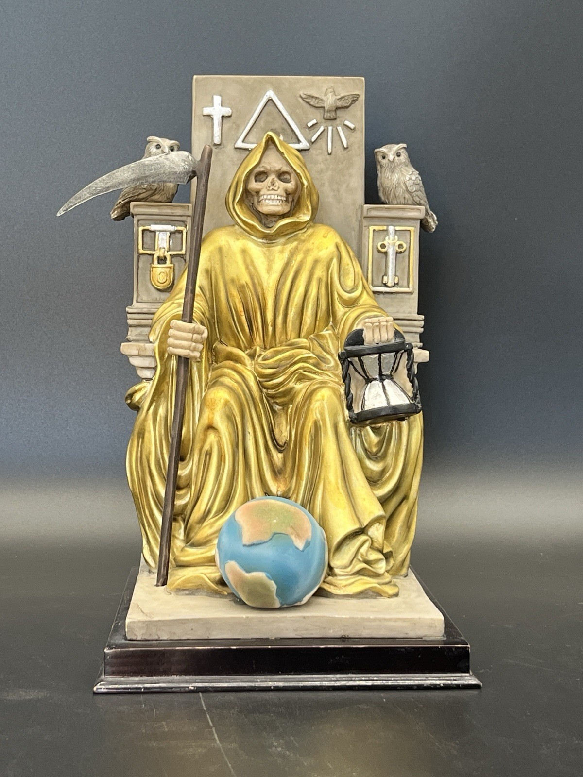 Ebros Golden Robe Santa Muerte Holy Seated On Throne with Scythe Statue 10.5
