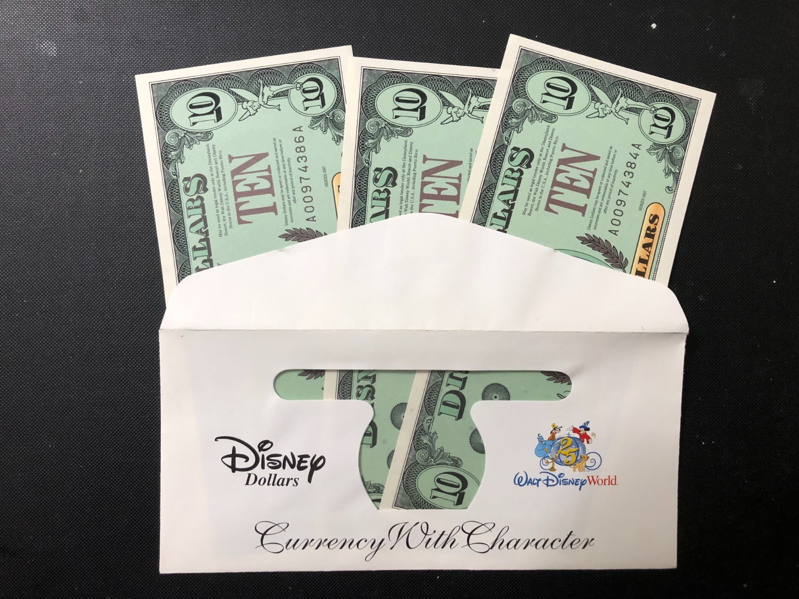 RARE Disney Dollars 25th Aniv. $10 w/ Envelope Consecutive Numbers Very Rare RARE Disney Dollars 25th Aniv. $10 w/ Envelope Consecutive Numbers Very Rare