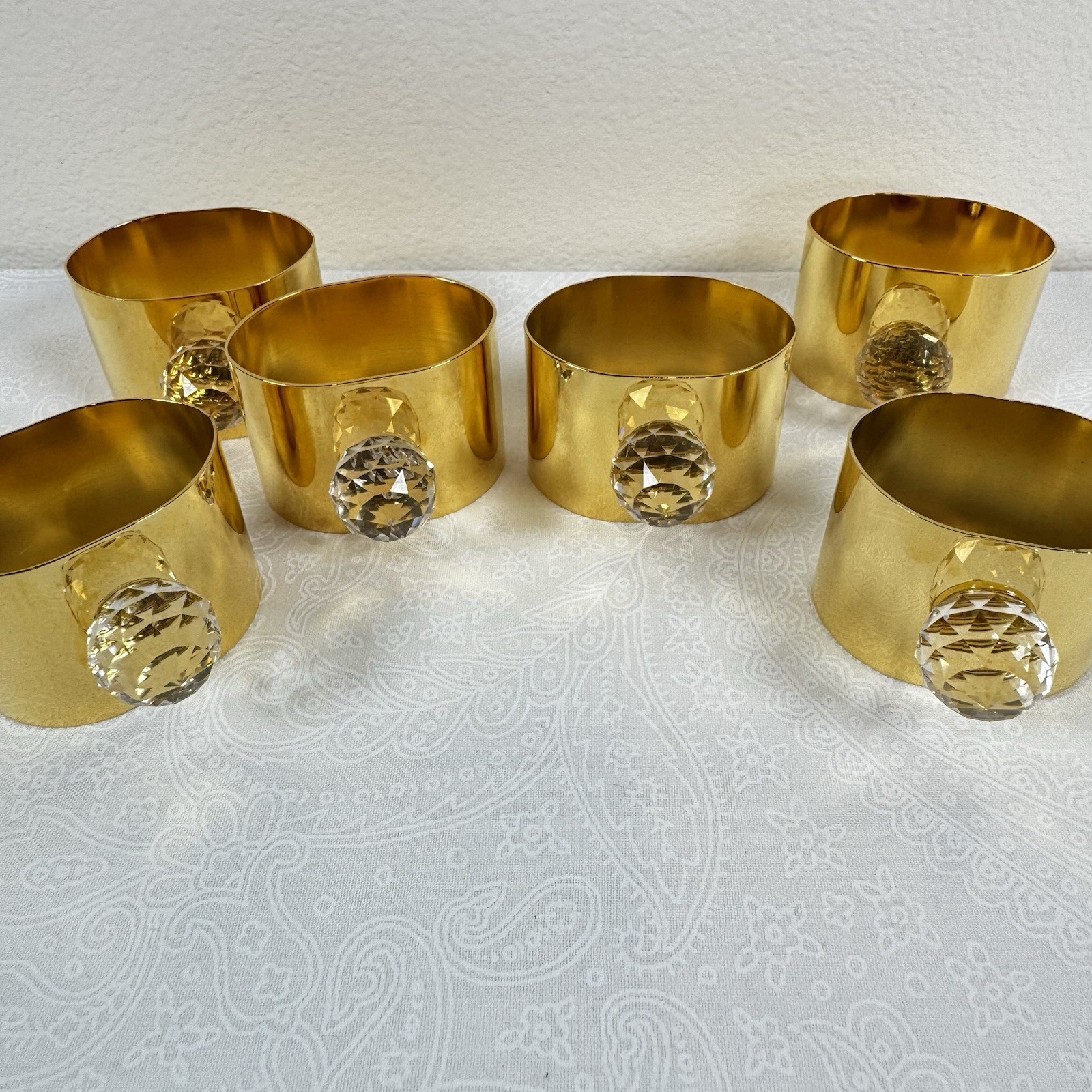VTG VALERIO ALBARELLO 6 24KT GOLD PLATED SWAROVSKI CRYSTAL ADORNED NAPKIN RINGS VTG VALERIO ALBARELLO 6 24KT GOLD PLATED SWAROVSKI CRYSTAL ADORNED NAPKIN RINGS