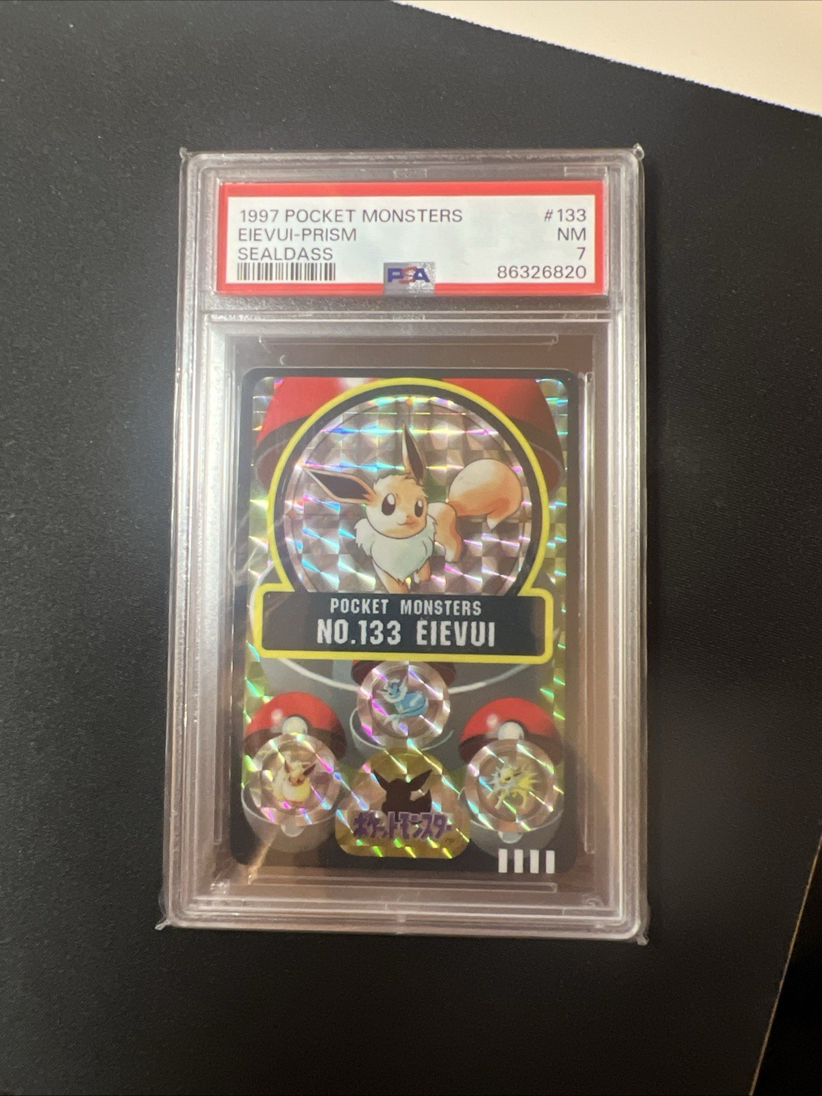 PSA 7 Eevee Prism No.133 Sealdass Japanese Pokemon 1997 PSA 7 Eevee Prism No.133 Sealdass Japanese Pokemon 1997
