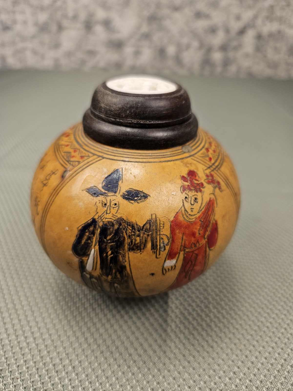 Chinese carved gourd cricket cage with a wooden lid and natural insert Chinese carved gourd cricket cage with a wooden lid and natural insert