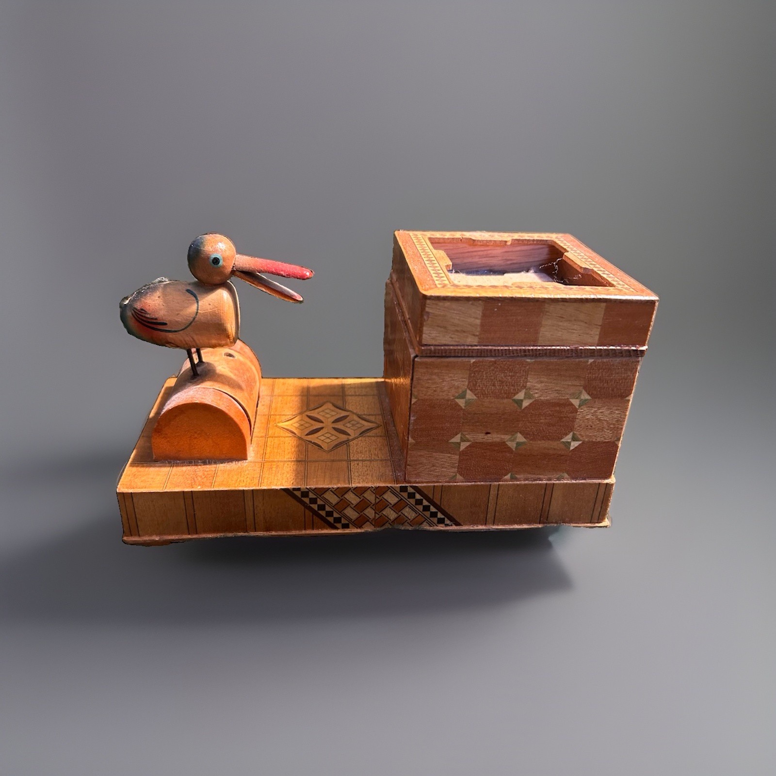 Vintage 1940’s Wooden Mechanical Bird Cigarette Dispenser Vintage 1940’s Wooden Mechanical Bird Cigarette Dispenser