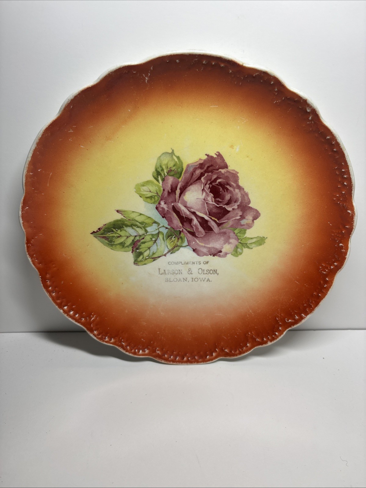 Vintage Sloan Iowa Advertising Plate Compliments Of Larson & Olson Vintage Sloan Iowa Advertising Plate Compliments Of Larson & Olson